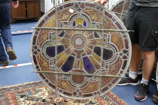 A set of eleven 19th century stained glass roundels, diameter 24in.